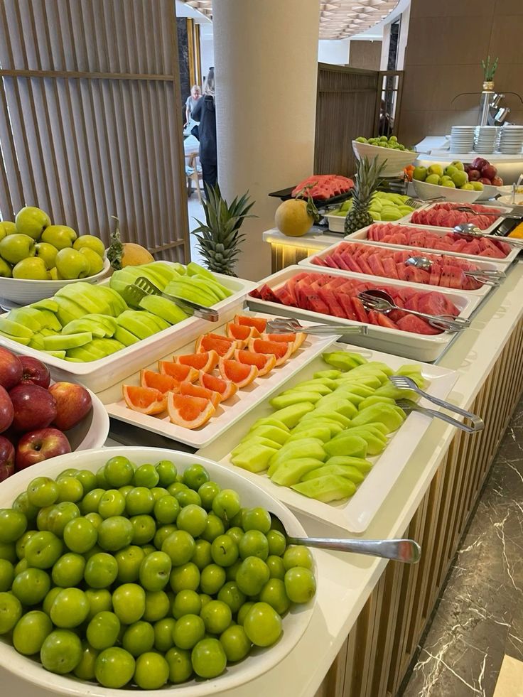 Parvixo dining space with quiet table setting, matte surfaces, and soft pendant lighting